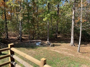 A fire pit and plenty of space to run around.