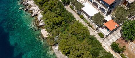 Aerial view of Luxury beachfront villa Korcula Magnificent with private heated pool, jacuzzi and sauna 