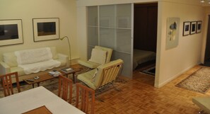 entrance to bedroom with queen bed