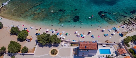 The beach near Croatian luxury vacation villa Korcula the Beach with pool, seauna and gym.