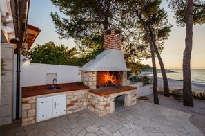  Outdoor grill on the terrace of the traditional beachfront villa with private parking on Brac island