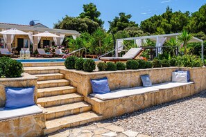 Garden of a family vacation villa Mir