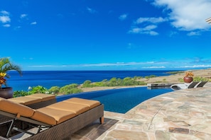 Miles of uninterrupted views. There are 6 lounge chairs on pool patio