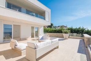 Comfortable seating on the spacious outdoor terrace of the luxury family vacation villa Primosten Glamour 