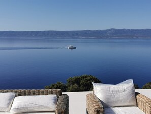 Seating area on the terrace of Croatia luxury pool villa with sea view perfect for family vacation