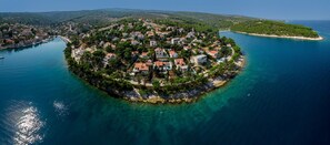 Aerial view of the luxury villa Dream and Live next to the pebble beach on the island of Brač