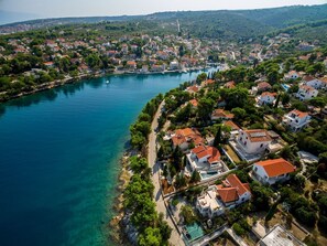 Aerial view of the luxury rental villa Dream and Live next to the pebble beach on the island of Brač