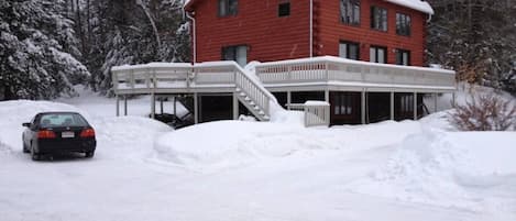 Flat, wide, plowed driveway for easy winter parking for many cars.