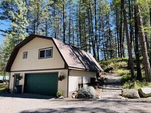 Front view of our Peaceful Chalet with main entrance to the right up the path