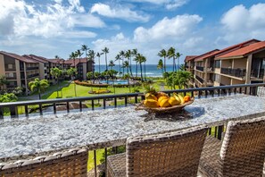 View from lanai showing the custom long table that seats 6 people.