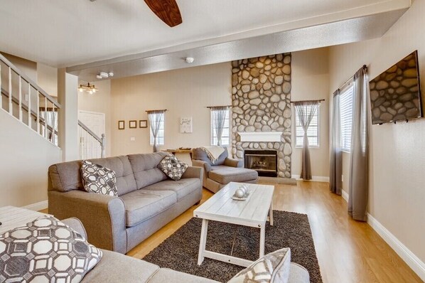 Living room with full sized pullout bed and complimentary Netflix. 
