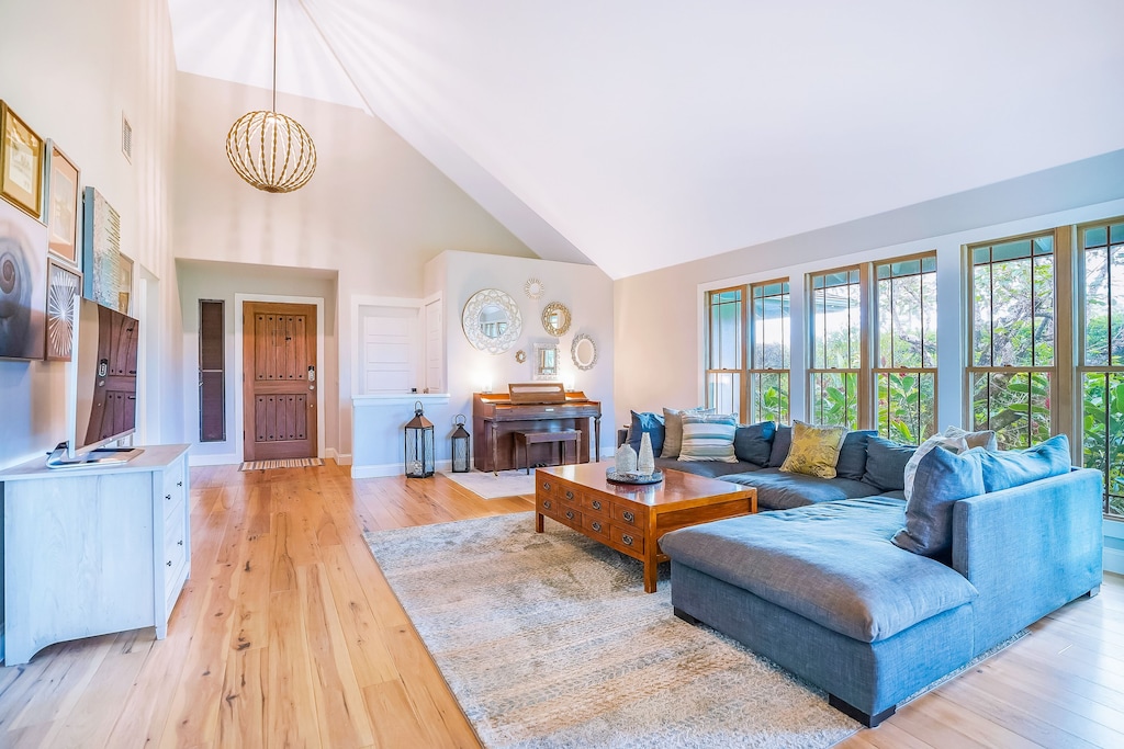 Neutral-toned interior with blue couch in Kauai