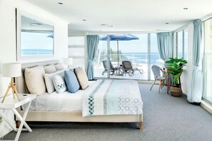 Extra large master suite with balcony access.