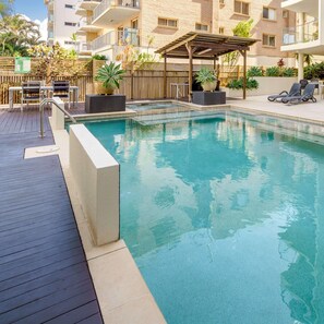 The large swimming pool is a great space to unwind and a great spot to play with the kids.