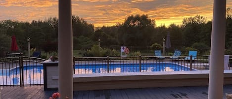 Wonderful Sunsets! Large Spacious Deck connected to the Pool for Outdoor Gatherings and Grilling Out!