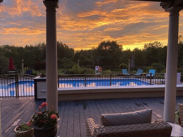 Wonderful Sunsets! Large Spacious Deck connected to the Pool for Outdoor Gatherings and Grilling Out!