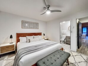 Main floor king master suite boasts an en-suite bathroom and smart TV (no cable access).