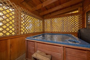 Hot tub is located on the back deck, open all year round