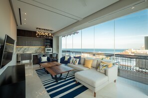 Comfortable living room with ocean breeze coming from the back