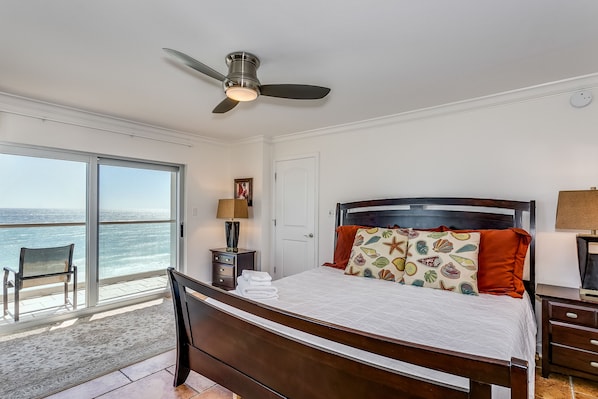 Master bedroom with en suite bathroom.
King size bed, and access to your gulf-front balcony!