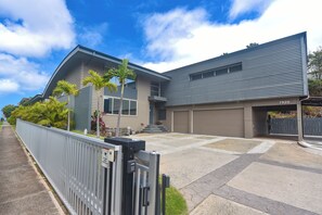 Front of Hale Maluhia , with private gate and secured parking area. 