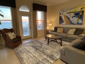 Comfortable couch and loveseat to relax on and enjoy the views or watch TV. 