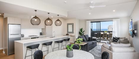 Large kitchen opens to the living and dining area