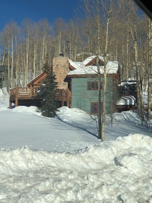 Front view  of home of front deck
