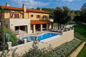 Surrounding of Luxury holiday Villa Labin Palace for vacation and rent with private pool and tennis court.