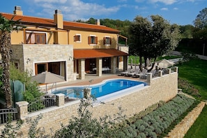 Surrounding of Luxury holiday Villa Labin Palace for vacation and rent with private pool and tennis court.