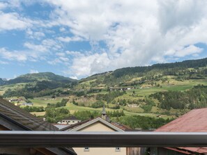 Sky, Cloud, Roof, Mountainous Landforms, Mountain, Wilderness, Property, Highland, Daytime, Hill