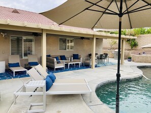 Lounge by the Pool with outdoor sectional, dining and loungers