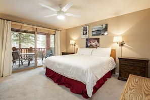 Main bedroom features a king-sized bed