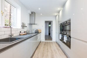 Kitchen end, looking into the house