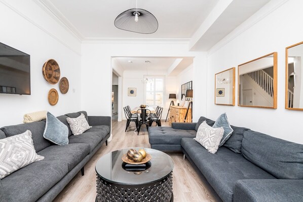 Open plan living area into dining room