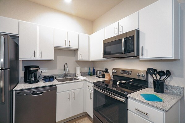 Fully equipped kitchens with full size appliances