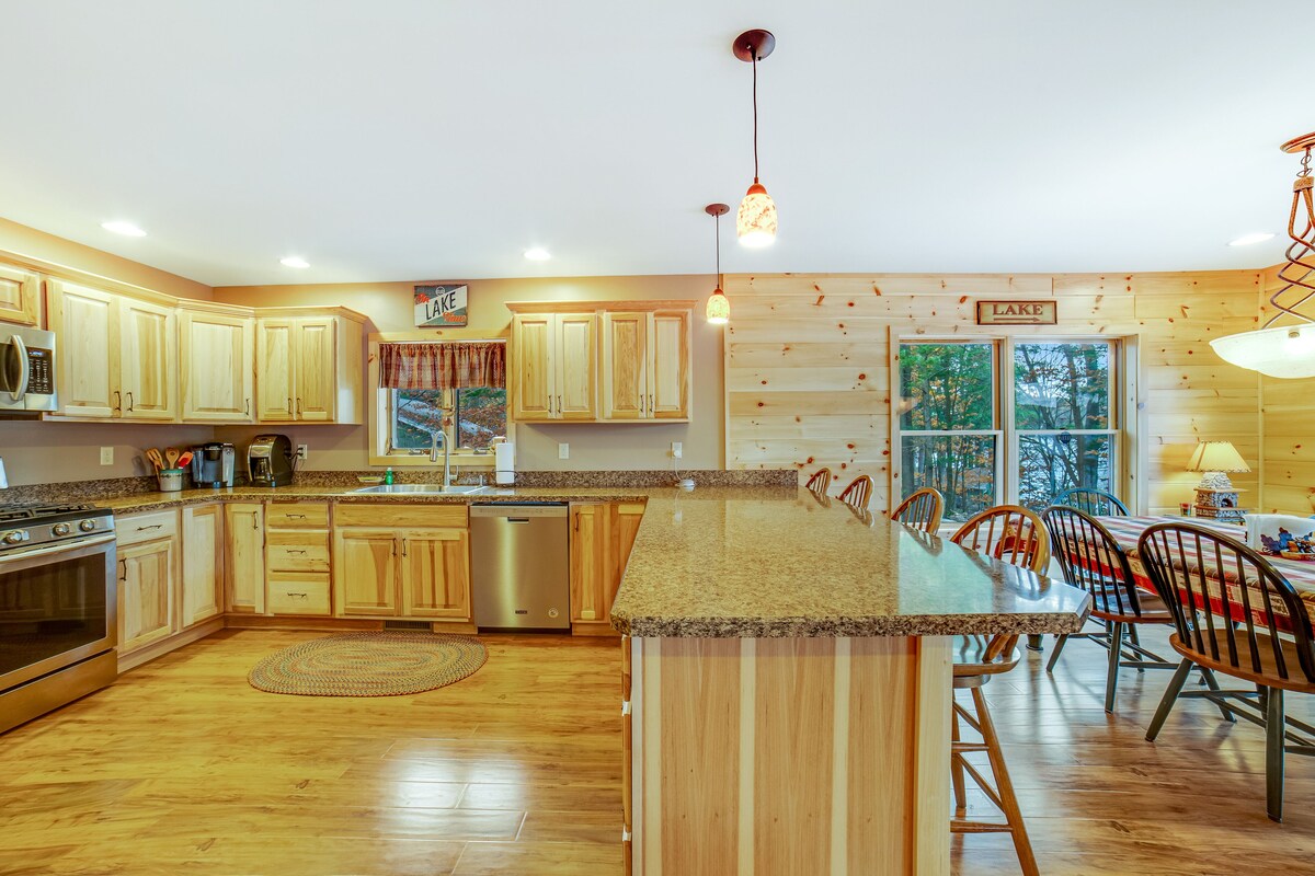 Gorgeous Lakefront Home with a Fire Pit, Two Living Areas, and a Sunroom