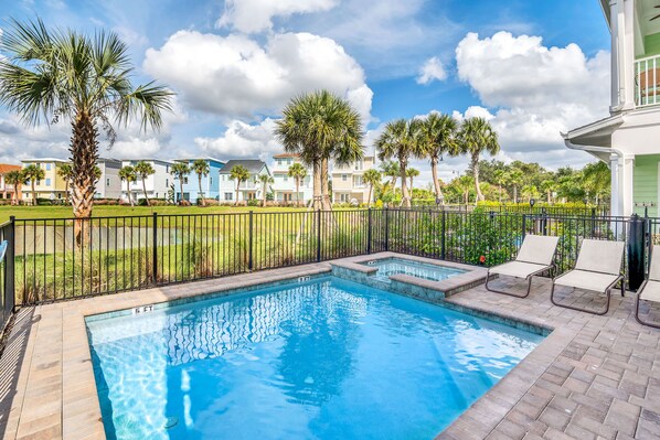 Sun-soaked Elegance: Bask in the glory of our outdoor swimming pool, where every moment is a picture-perfect escape, complemented by cozy lounge chairs for your utmost comfort.