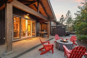 Firepit with  rustic timber framing in this perfect sunset gathering spot