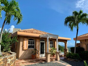 Poolside Cottage; perfect for couples or solo traveler (Main house on right)