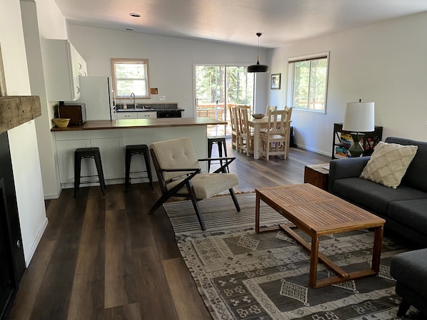 Open floor plan; great for gatherings. Sliding doors go to the deck.