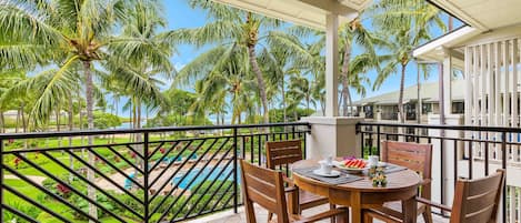 Lanai has views of the pool and distant ocean