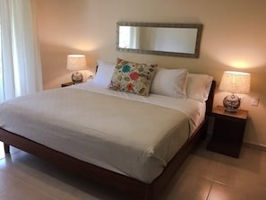 MAIN BEDROOM WITH KING SIZE BED