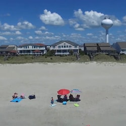Large Beach in Low AND High Tide.