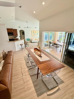 Dining for 10 open air wall of sliding doors to lanai