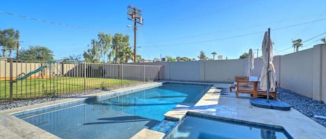 Heated Saltwater pool/spa combo. Outdoor couch w/umbrellas; Baja shelf & seating