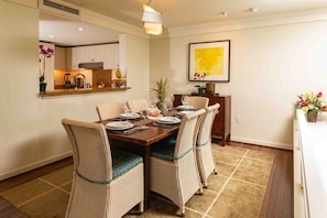 Dining room with newly painted chairs!