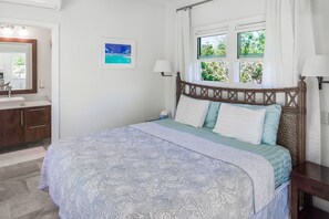 Experience the warmth and allure of a delightful bedroom, featuring a spacious King Size bed and a private en-suite bathroom