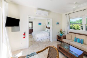 Experience serenity and calmness as you gaze upon a delightful garden vista from the comfort of your living room