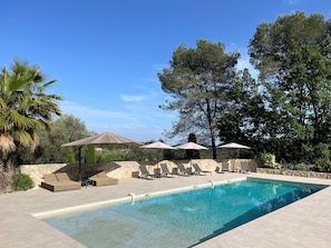 Pool terrace with children's play area.#